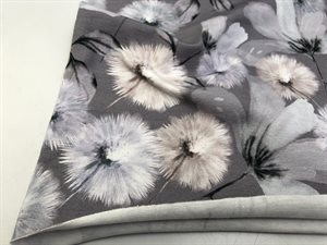 Bomuldsjersey - smukke mælkebøtter og blomster i blide grå toner